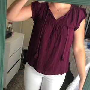 Short sleeve blouse with tassels